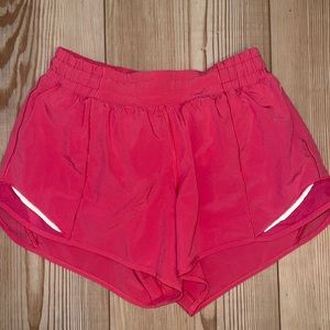 pink lululemon size 6 long shorts!! not sure the exact color name never worn!!